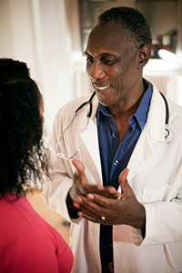 Doctor speaking to a female patient