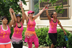 A group of people in bright outfits at VA2K event