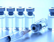 Syringe and a row of vials Syringe and a row of vials