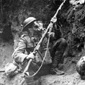 World War I soldier in trench wearing gasmask