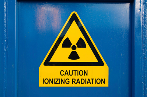 Radiation sign on a blue door