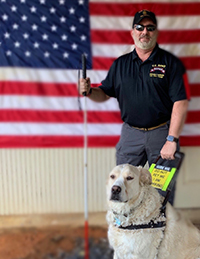 Brian Davis and his service dog