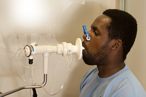 Man volunteering for a breath test.