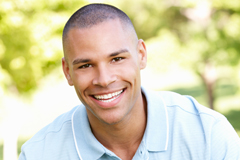 Photo of young Veteran smiling.