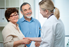 Doctor with  male veteran and his wife