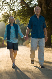 An older couple out for a walk.