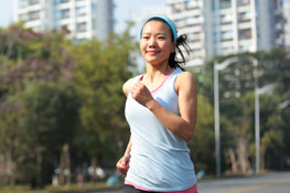 A young woman jogging in the city