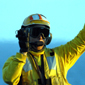 Crewman standing on flight deck