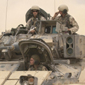 Tank crew in desert